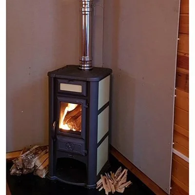 Подключение дымохода через адаптер к печке